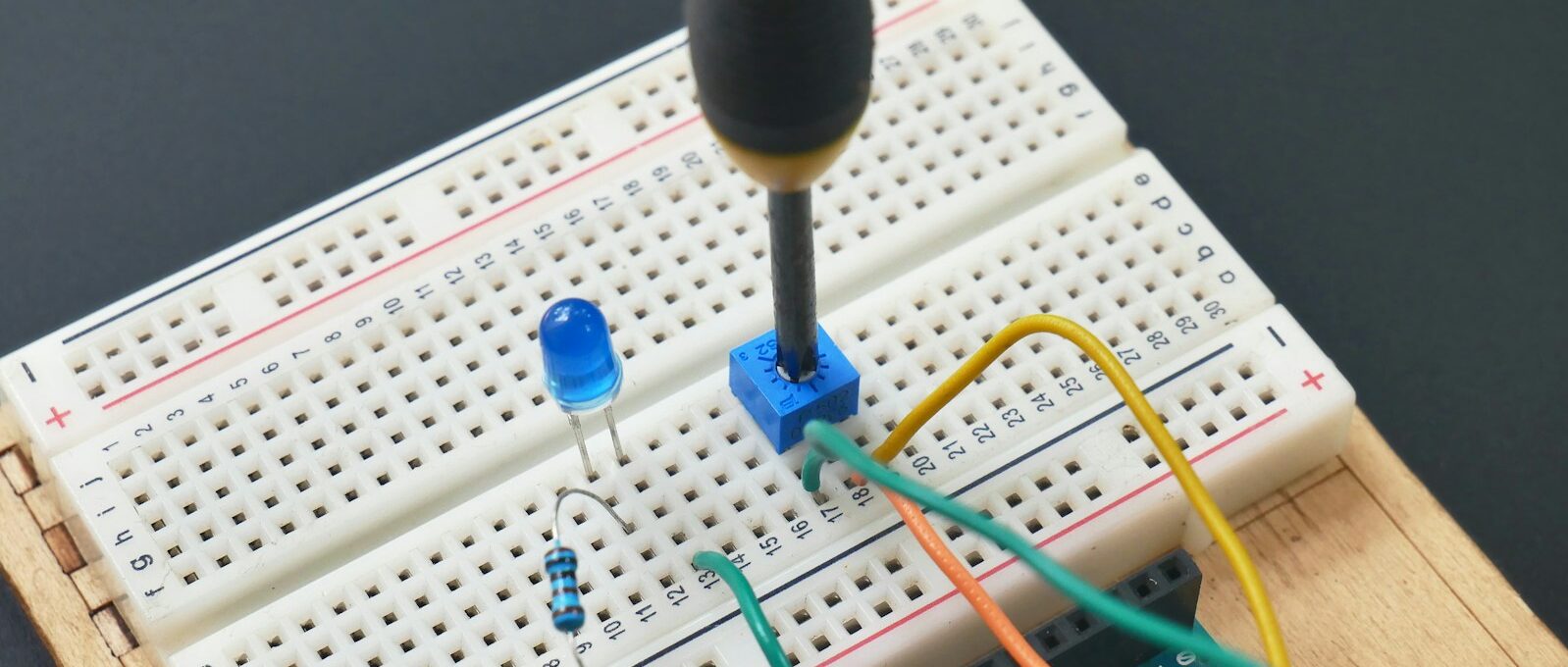 a soldering soldering tool is attached to a bread board