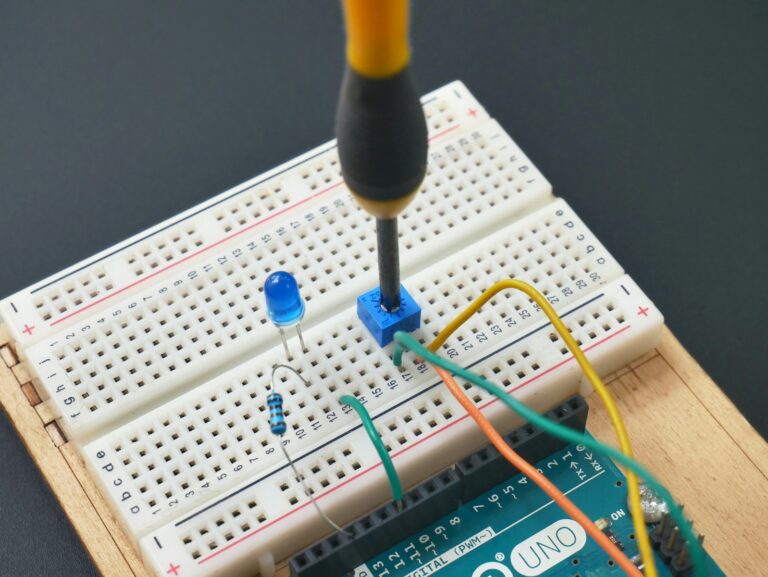 a soldering soldering tool is attached to a bread board